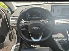2023 Geely Emgrand 4th Gen Champion 1.5L MT Luxury, белый — фото 12