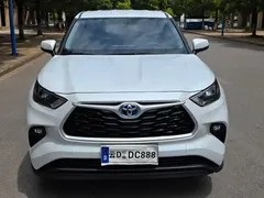 2022 Toyota Highlander Hybrid 2.5L 4WD Elite 7, белый — фото 2