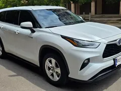 2022 Toyota Highlander Hybrid 2.5L 4WD Elite 7, белый — фото 3