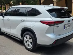 2022 Toyota Highlander Hybrid 2.5L 4WD Elite 7, белый — фото 4