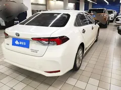 2021 Toyota Corolla Hybrid 1.8L E-CVT Elite, белый — фото 3