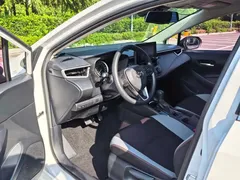 2021 Toyota Corolla 1.2T S-CVT Pioneer, белый — фото 7