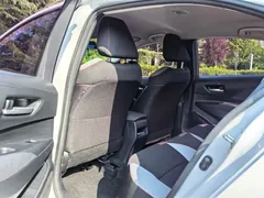 2021 Toyota Corolla 1.2T S-CVT Pioneer, белый — фото 8