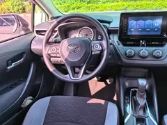 2021 Toyota Corolla 1.2T S-CVT Pioneer, белый — фото 12