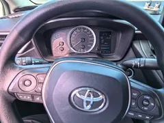 2021 Toyota Corolla 1.2T S-CVT Pioneer, белый — фото 14