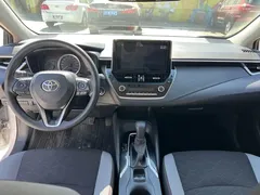 2023 Toyota Corolla 1.2T Elite, белый — фото 7