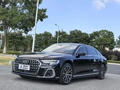 2023 Audi A8L 50 TFSI quattro Select, чёрный — фото 1