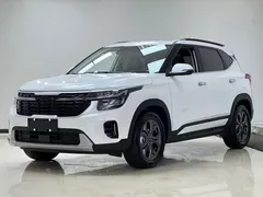 2023 Kia Seltos 1.5L CVT Luxury, белый — фото 1