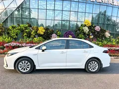 2021 Toyota Corolla Hybrid 1.8L E-CVT Elite, белый — фото 3