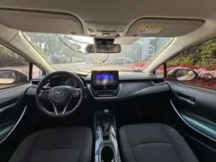 2021 Toyota Corolla Hybrid 1.8L E-CVT Elite, белый — фото 6