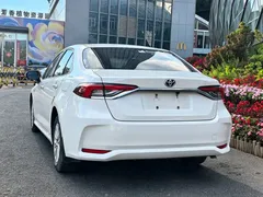 2021 Toyota Corolla Hybrid 1.8L E-CVT Elite, белый — фото 10