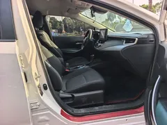2021 Toyota Corolla Hybrid 1.8L E-CVT Elite, белый — фото 12