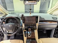 2021 Toyota Alphard Hybrid 2.5L Luxury, чёрный — фото 7