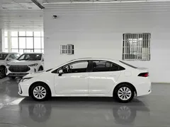 2021 Toyota Corolla TNGA 1.5L CVT Elite, белый — фото 2
