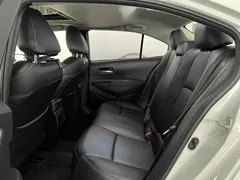 2021 Toyota Corolla TNGA 1.5L CVT Elite, белый — фото 14