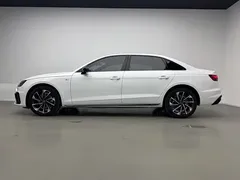 2023 Audi A4L 40 TFSI Luxury Dynamic, белый — фото 3