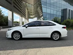 2023 Toyota Corolla 1.2T Elite, белый — фото 8