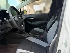 2023 Toyota Corolla 1.2T Elite, белый — фото 10