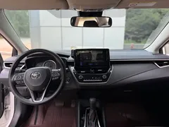 2023 Toyota Corolla 1.2T Elite, белый — фото 13