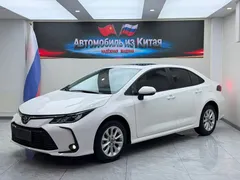 2021 Toyota Corolla 1.2T S-CVT Elite Plus, белый — фото 1
