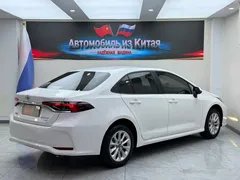 2021 Toyota Corolla 1.2T S-CVT Elite Plus, белый — фото 4