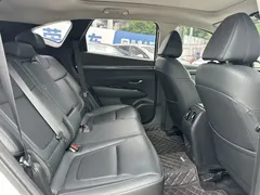 2021 Hyundai Tucson L 1.5T DCT LUX Premium, белый — фото 11