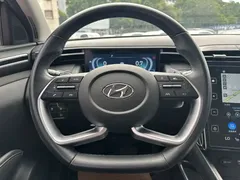 2021 Hyundai Tucson L 1.5T DCT LUX Premium, белый — фото 18