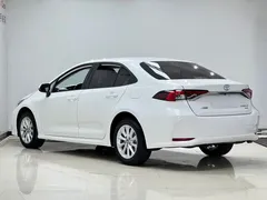 2021 Toyota Corolla 1.2T S-CVT Elite, белый — фото 4