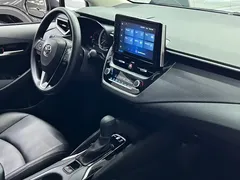 2021 Toyota Corolla 1.2T S-CVT Elite, белый — фото 19