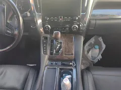 2021 Toyota Alphard Hybrid 2.5L Premium, белый — фото 16