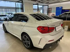 2021 BMW 1 Series 120i M Sport, белый — фото 7