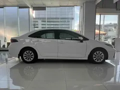 2021 Toyota Corolla TNGA 1.5L CVT Elite, белый — фото 4