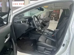 2021 Toyota Corolla TNGA 1.5L CVT Elite, белый — фото 9
