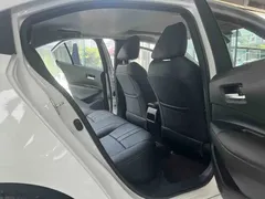 2021 Toyota Corolla TNGA 1.5L CVT Elite, белый — фото 11