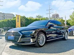 2022 Audi A8L 50 TFSI quattro, чёрный — фото 1