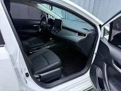 2021 Toyota Corolla 1.2T S-CVT Elite, белый — фото 20