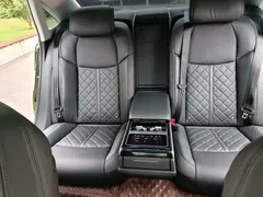 2022 Audi A8L 50 TFSI quattro, чёрный — фото 23