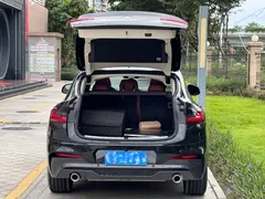 2021 BMW X4 xDrive 25i M, чёрный — фото 7