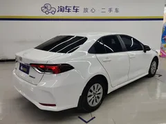 2021 Toyota Corolla TNGA 1.5L CVT Elite, белый — фото 3