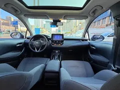 2021 Toyota Corolla 1.2T S-CVT Elite, белый — фото 9