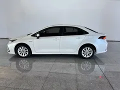 2021 Toyota Corolla Hybrid 1.8L E-CVT Elite, белый — фото 2
