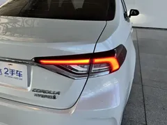 2021 Toyota Corolla Hybrid 1.8L E-CVT Elite, белый — фото 4