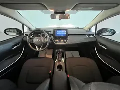 2021 Toyota Corolla Hybrid 1.8L E-CVT Elite, белый — фото 11