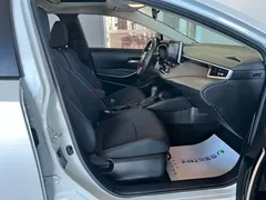 2021 Toyota Corolla Hybrid 1.8L E-CVT Elite, белый — фото 14