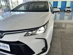 2021 Toyota Corolla Hybrid 1.8L E-CVT Elite, белый — фото 18