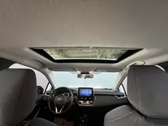 2021 Toyota Corolla Hybrid 1.8L E-CVT Elite, белый — фото 19