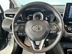2021 Toyota Corolla Hybrid 1.8L E-CVT Elite, белый — фото 20