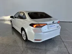 2021 Toyota Corolla Hybrid 1.8L E-CVT Elite, белый — фото 22