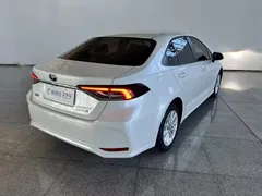 2021 Toyota Corolla Hybrid 1.8L E-CVT Elite, белый — фото 23