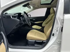 2021 Toyota Corolla 1.2T S-CVT Elite Plus, белый — фото 7